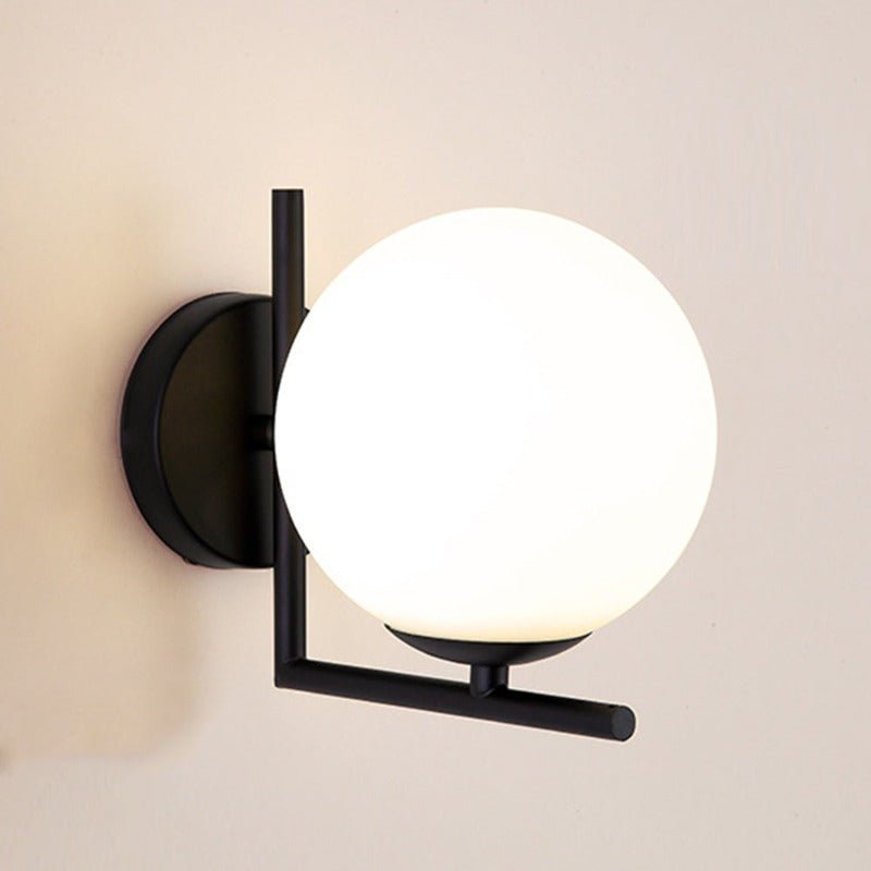 Applique murale en globe de verre avec cadre métallique
