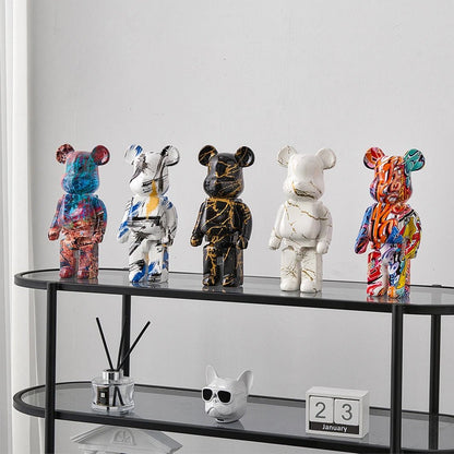 Sculpture d’ours en résine avec design graffiti et art de rue
